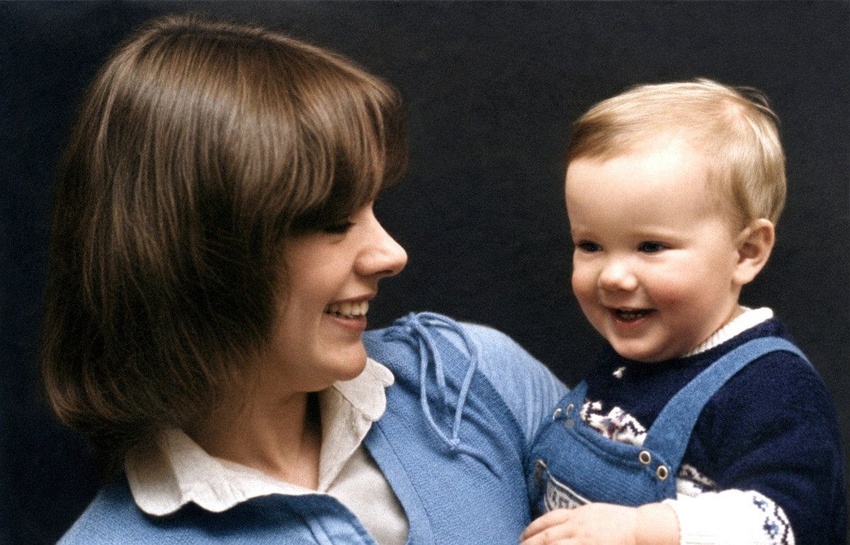 The same photograph restored and colourised